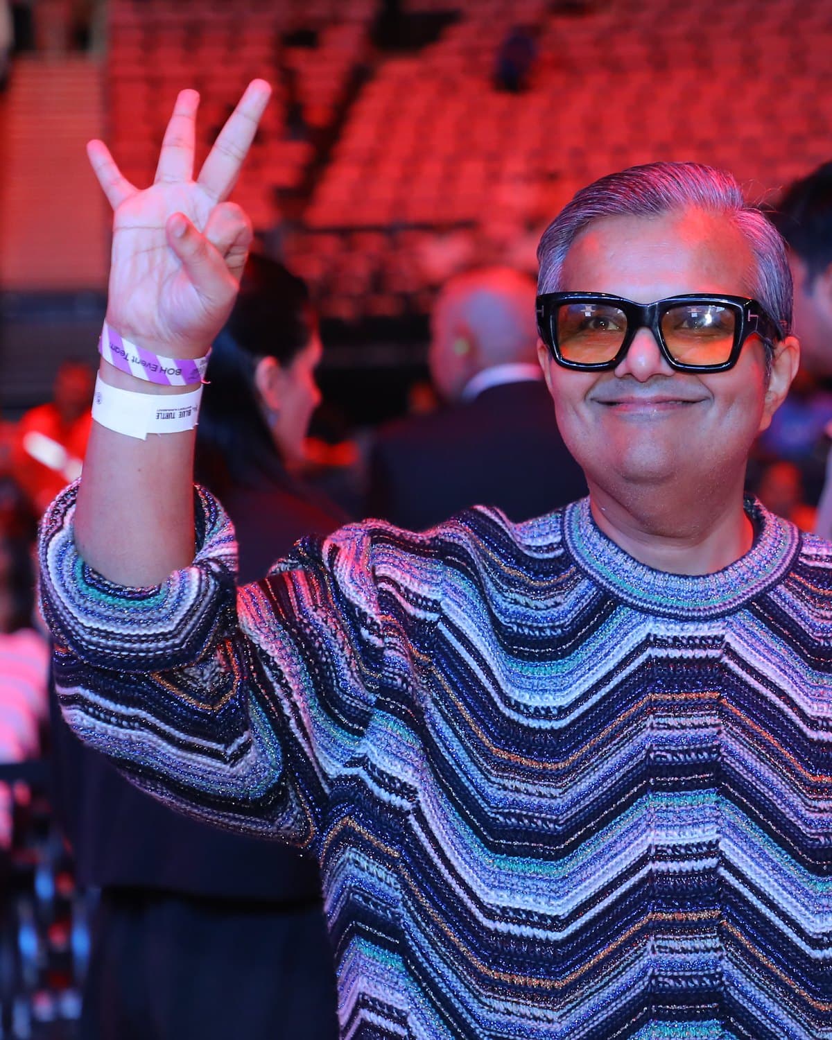 Kalpesh Kinariwala, smiling, in the arena on a HOP night